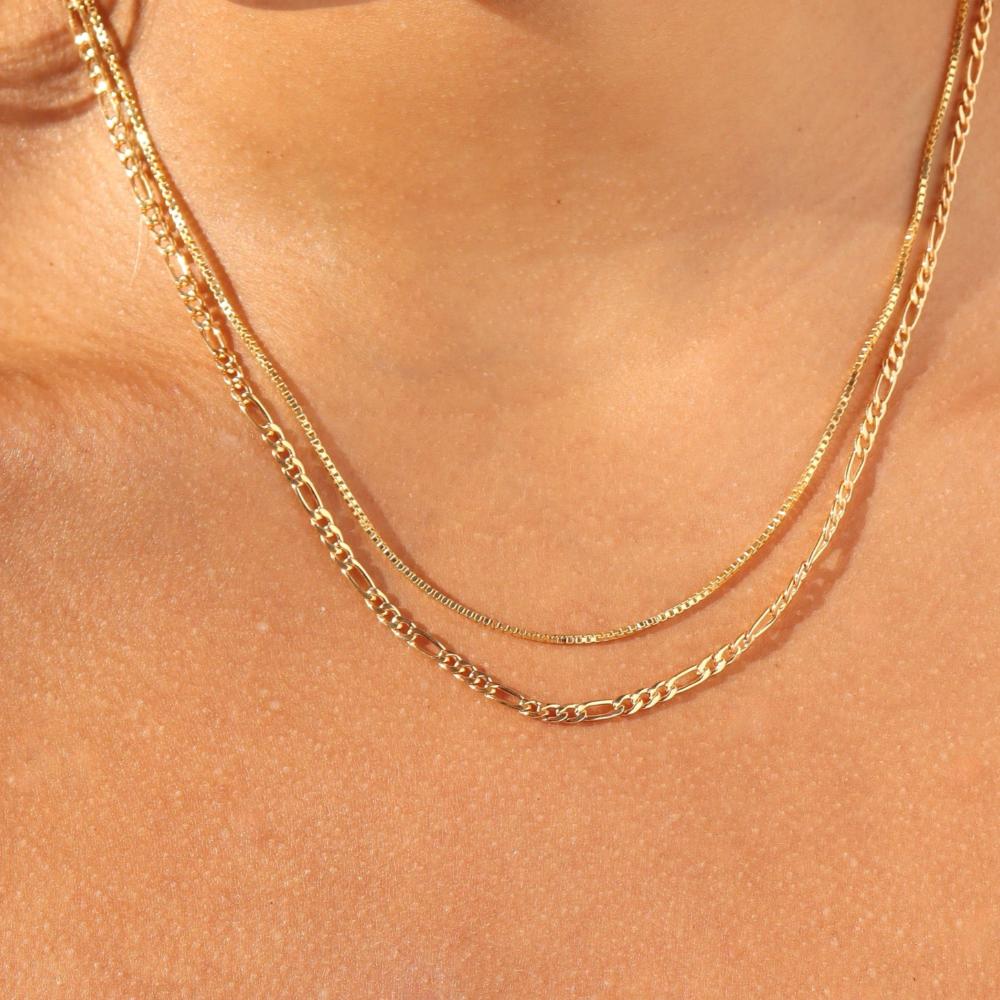 14k gold fill Gigi chain paired with the Delaney chain on model