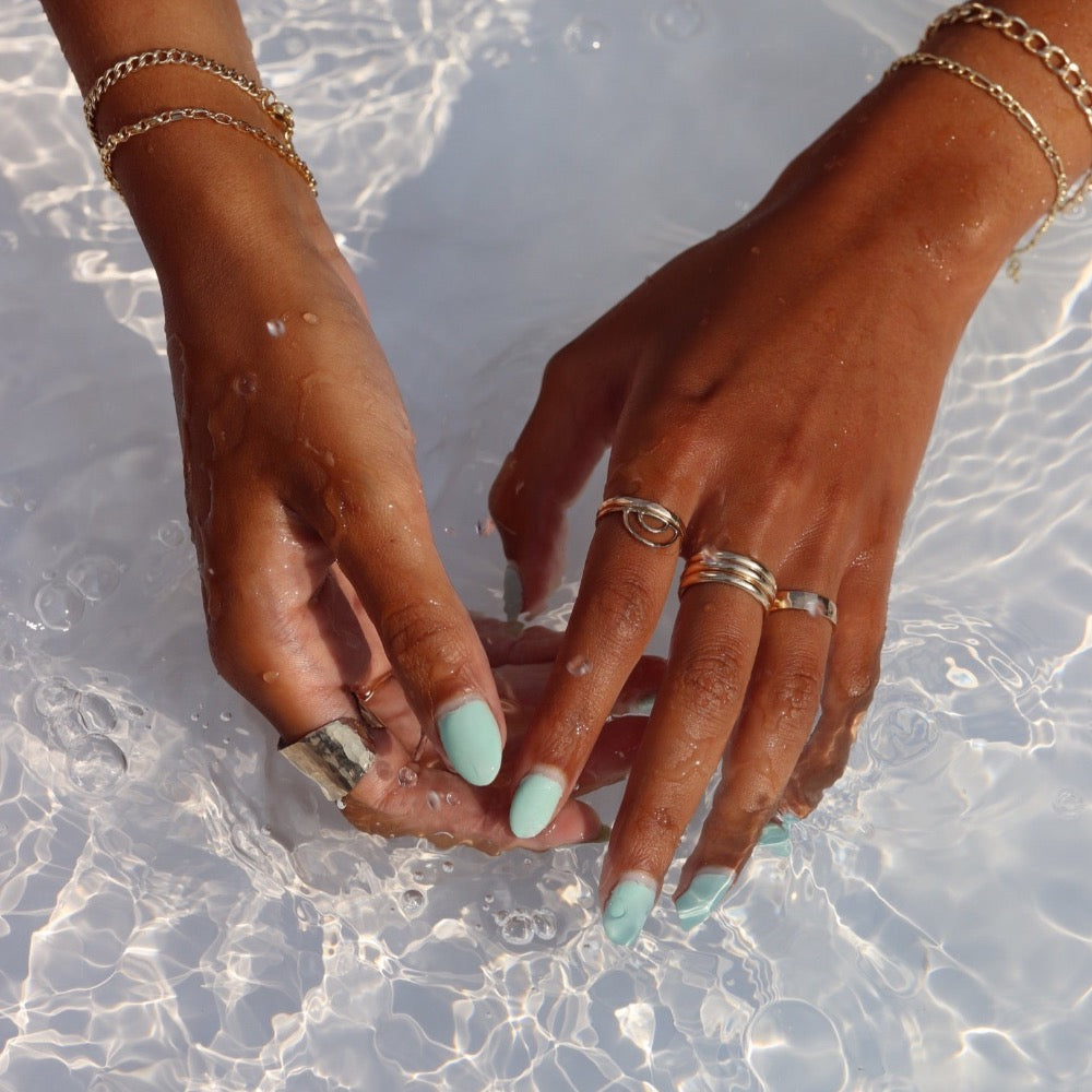 Model wearing 14k gold fill Trinity ring