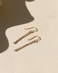 Handcrafted matchstick earrings in 14k gold fill or sterling silver, sleek and minimal with subtle texture, modern design perfect for layering or wearing alone.