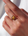 Model wearing 14k gold fill tigers eye ring