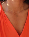 model wearing 14k gold fill spiral wire heart pendant necklace