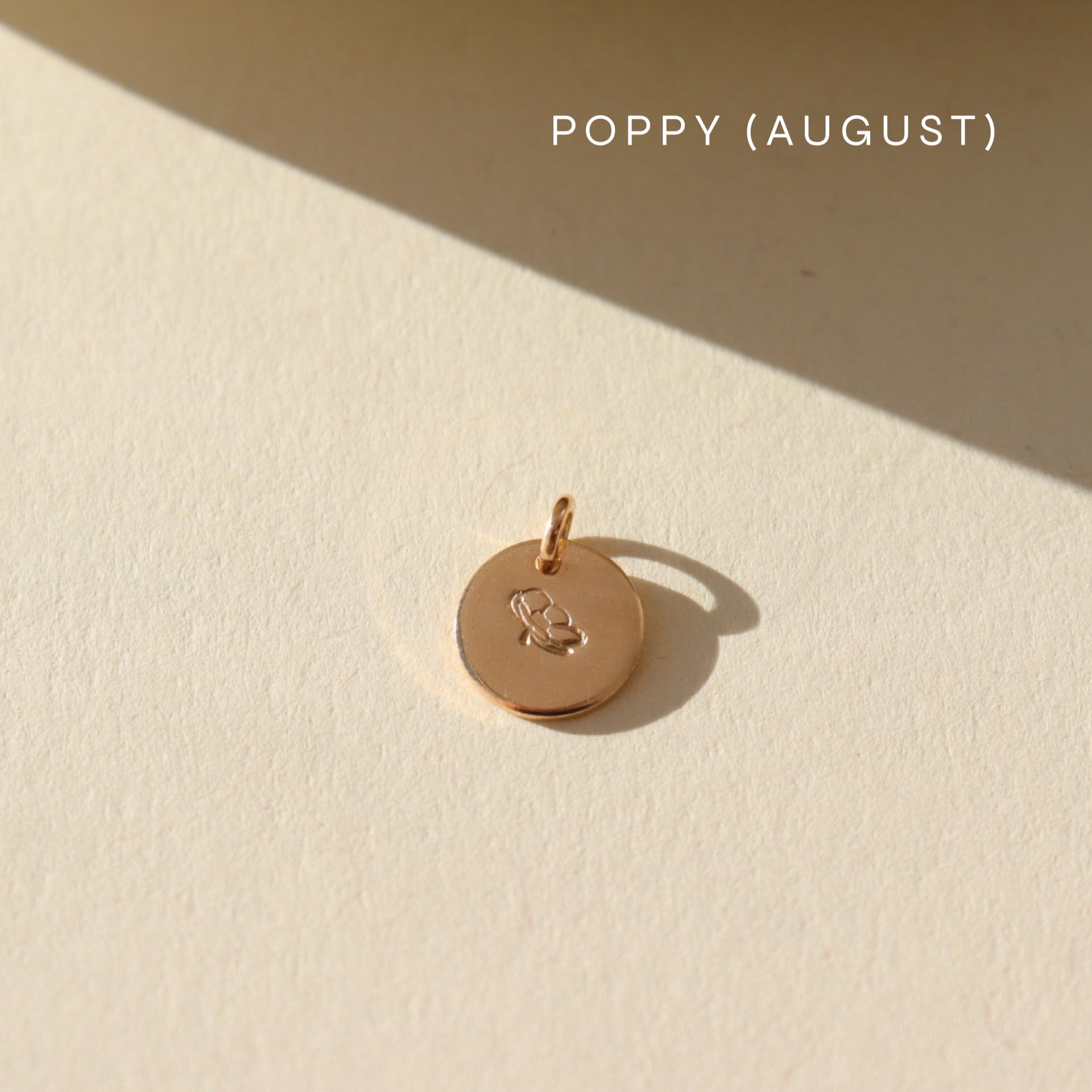 Birth Flower Charm Mother's Day Gifts, Personalized Jewelry, Handmade Jewelry, Gold coin that features a flower stamped by Token Jewelry in Eau Claire, WI