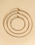 organic gold hoops | handmade by Token Jewelry in Eau Claire, Wisconsin