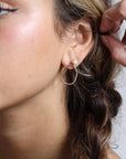 Model wearing 14k gold fill Emma pearl studs