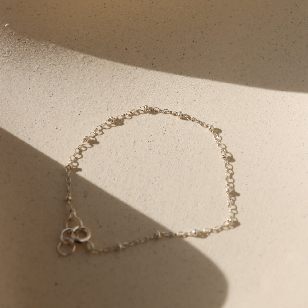 Beaded Bracelet with delicate textured beads that catch the light. Lightweight and timeless, perfect for layering or wearing alone.