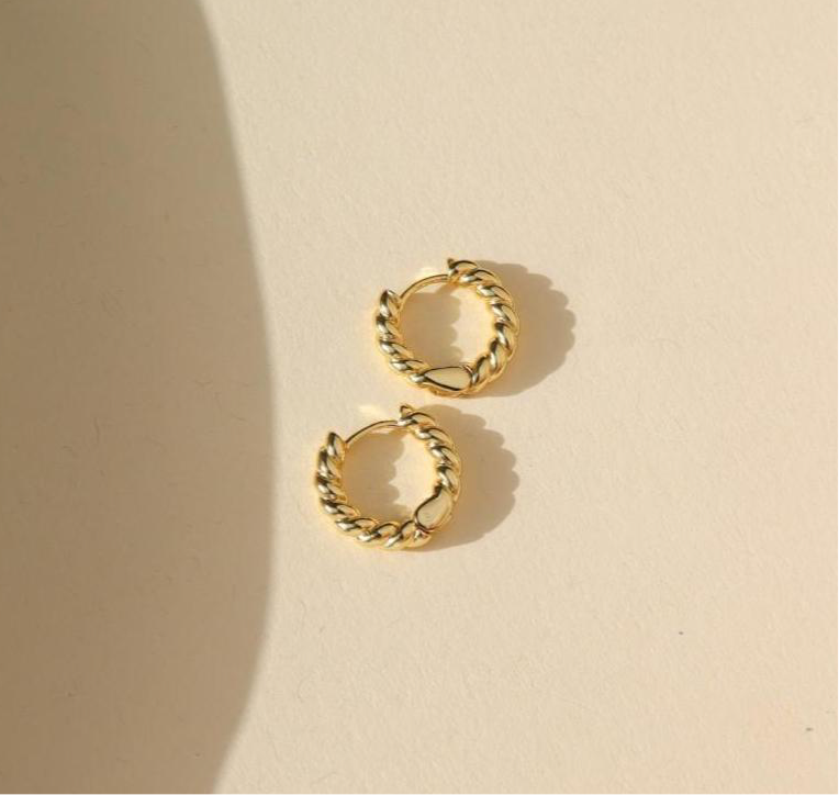 14k gold fill textured chunky hoops on a light background