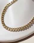 Demi Alexandra Bracelet laid on a white plate in the sunlight