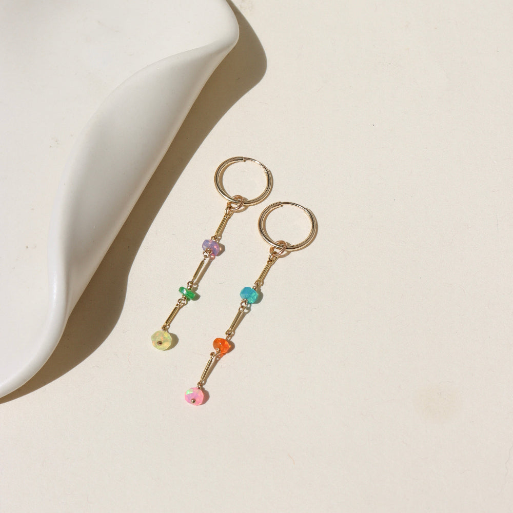 Disco Drop Earrings with colorful opals hanging from links.