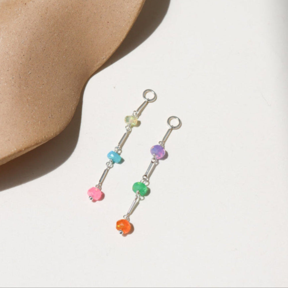 Disco Opal Earrings featuring six multicolored opals on a bar, dot, and dash chain design in sterling silver