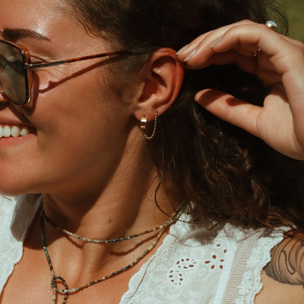 model wearing 14k gold fill chain studs