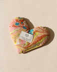 heart shaped eye pillow on a light background
