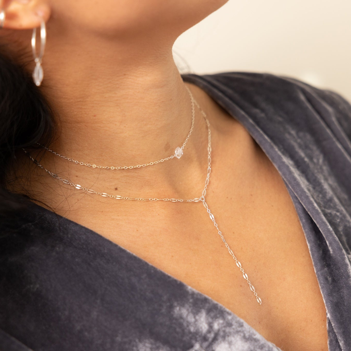 A radiant Herkimer diamond necklace with a naturally faceted quartz crystal, hand-set on a dainty sterling silver chain for everyday elegance.