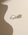 sterling silver esme ring - moonstone - laid in sunlight