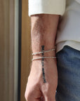 Model wearing Gio bracelet pair with Dylan bracelet.