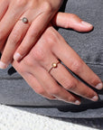 Model Wearing 14k gold fill Gaia Ring. This ring features a Spiral band with a zircon gemstone.
