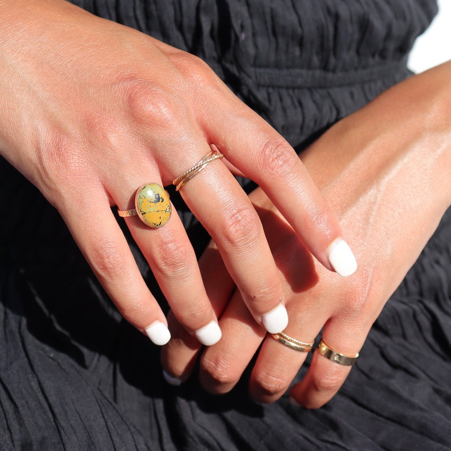 Model wearing 14k gold fill turquoise nomad ring