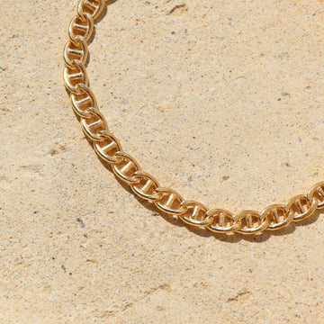 Marina Bracelet set out on a stoneware plate in the sun.