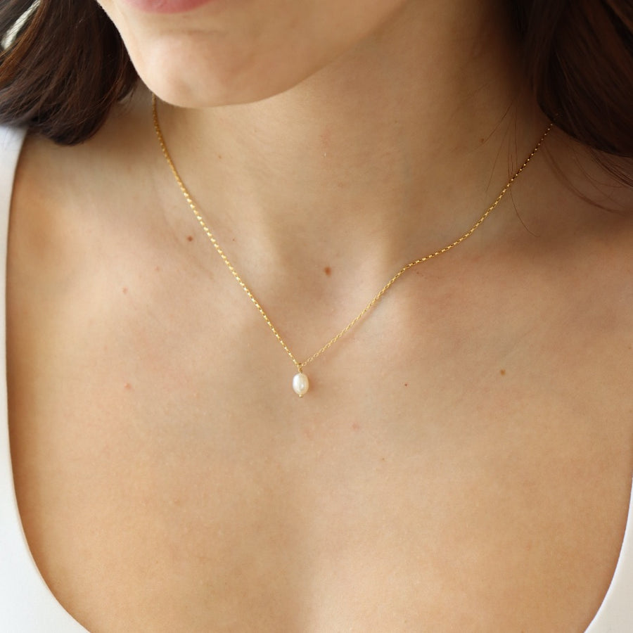 Featuring a delicate pearl and classic gold chain. Wedding Jewelry. Classic and Modern. Sterling Silver or 14k Gold Fill. Token Jewelry, handmade, hypoallergenic and waterproof.