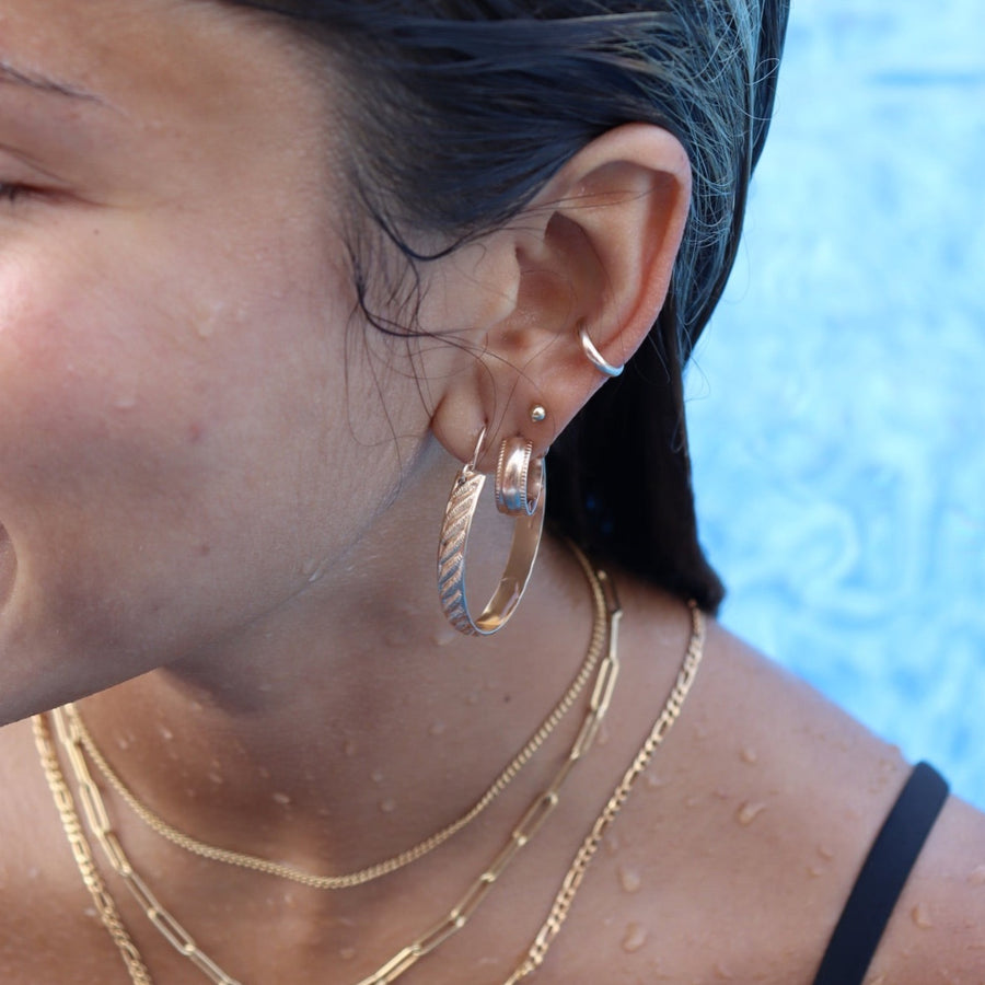 Model wearing 14k gold fill Simple Ear Cuff