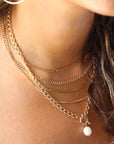Model wearing 14k gold fill Demi Alexandra chain 