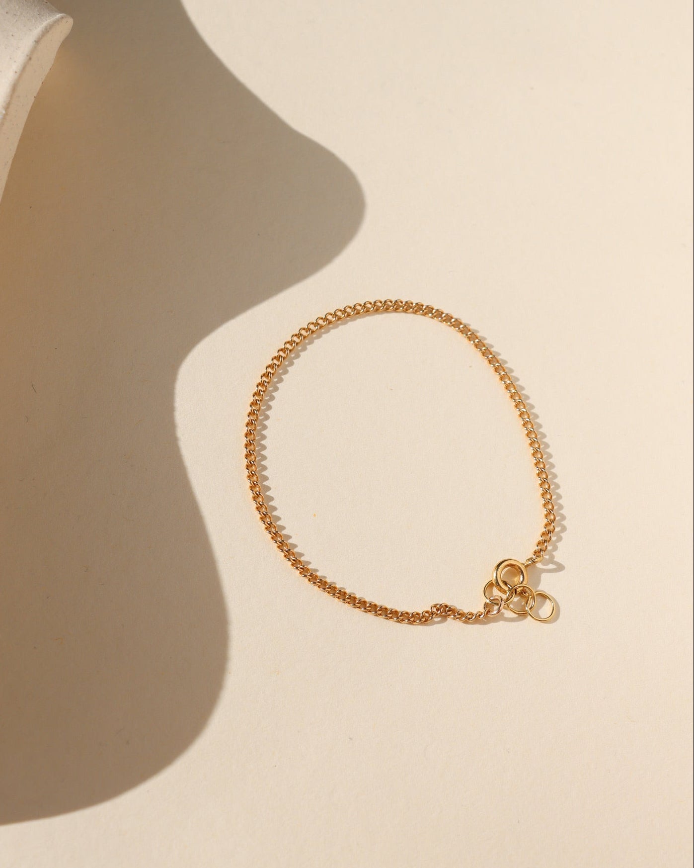 14k gold fill chain bracelet in the sunlight