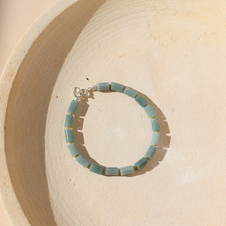 Jade and Serpentine gemstone beads alternate to make a bracelet with sterling silver fixings