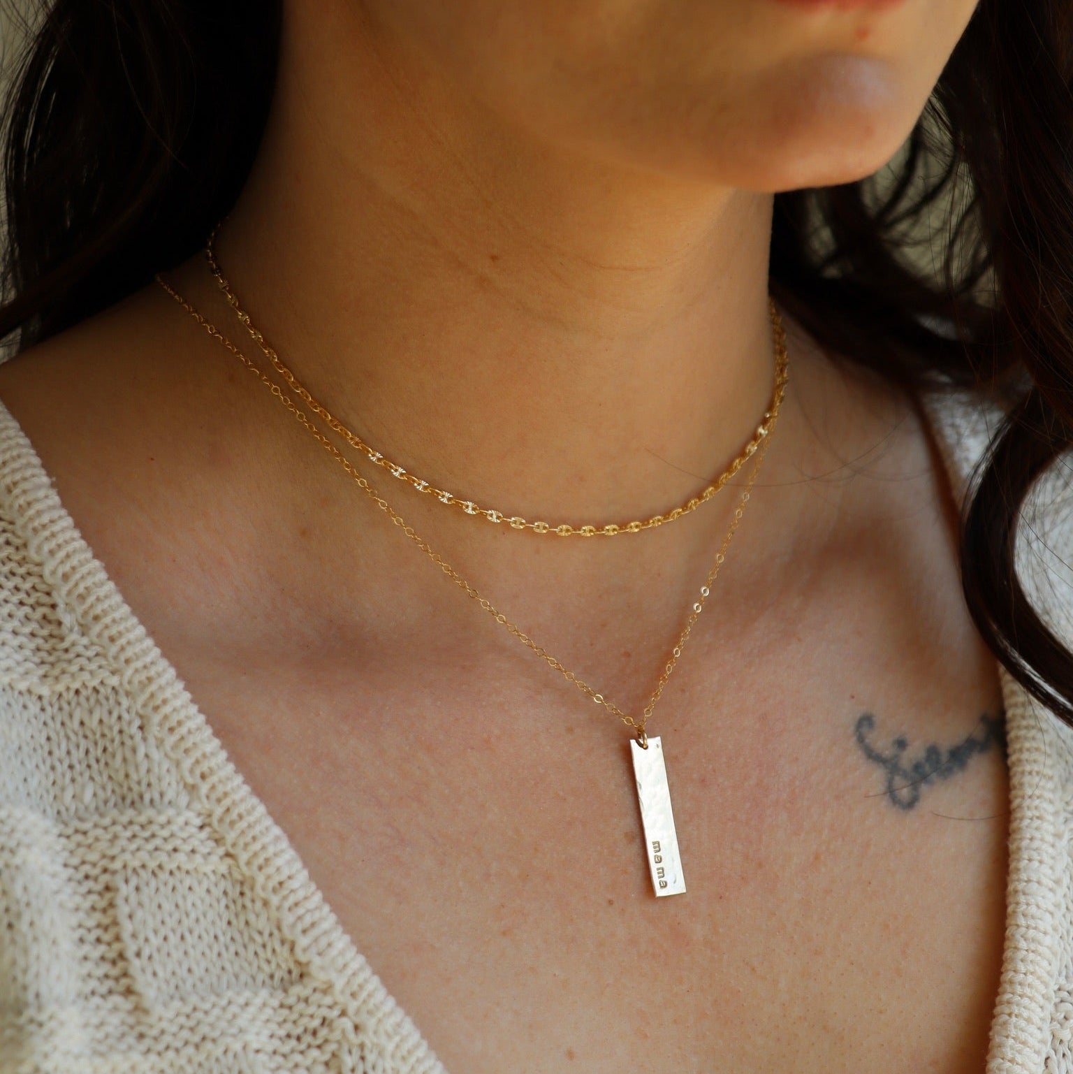 model wearing 14k gold fill sparkly chain with 14k gold fill delicate chain necklace with hand stamped bar charm