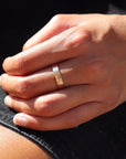 Model wearing Cigar Band in 14k gold fill