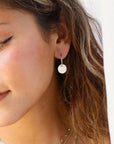  Model wearing Coin Hoops in 14k gold fill 
