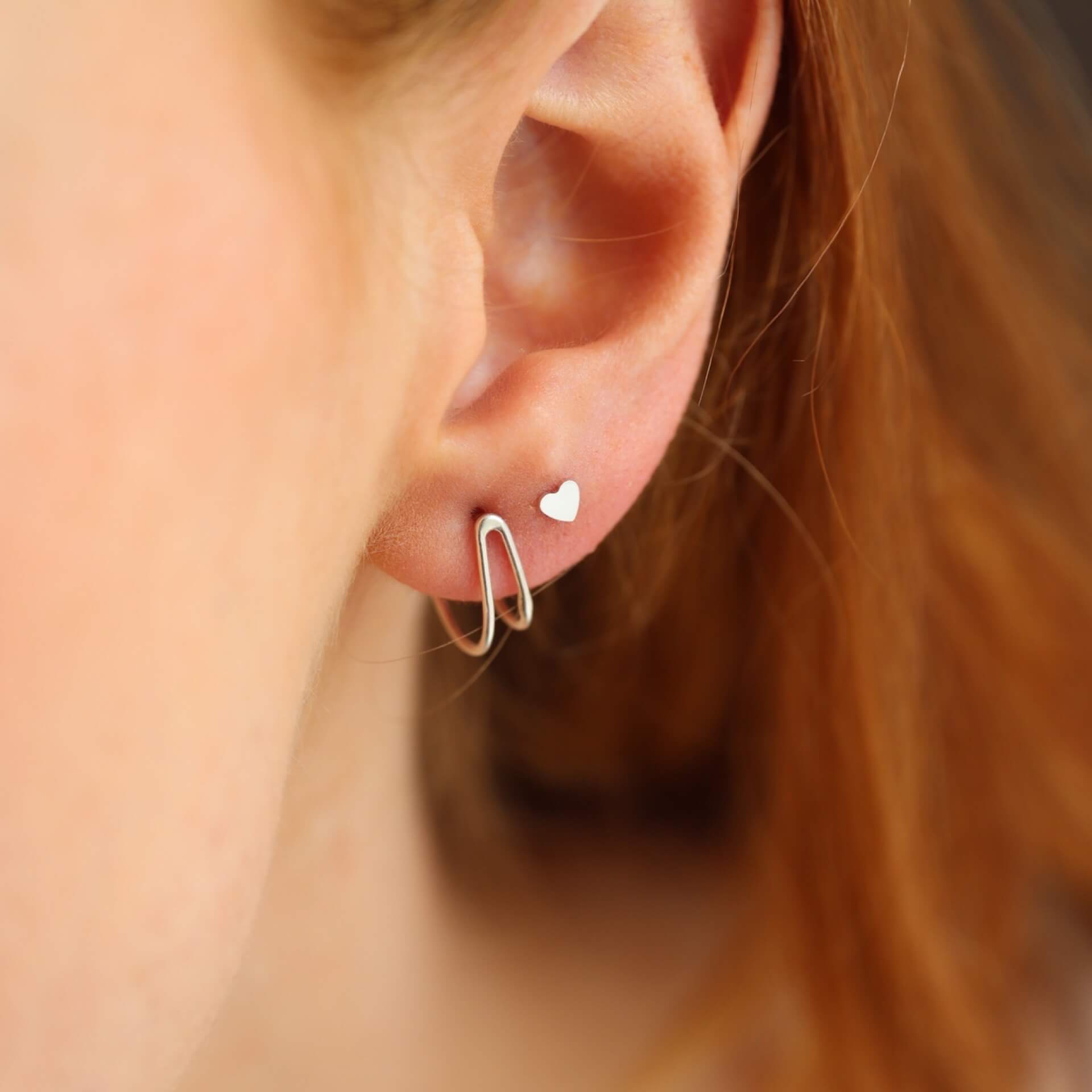 Model wearing Tiny Heart Studs - Token Jewelry - valentines day gifts for her - everyday effortless jewelry - valentines day jewelry - minimal modern jewelry - 14k gold fill - rose gold - sterling silver - local jewelry store - jewelry store near me