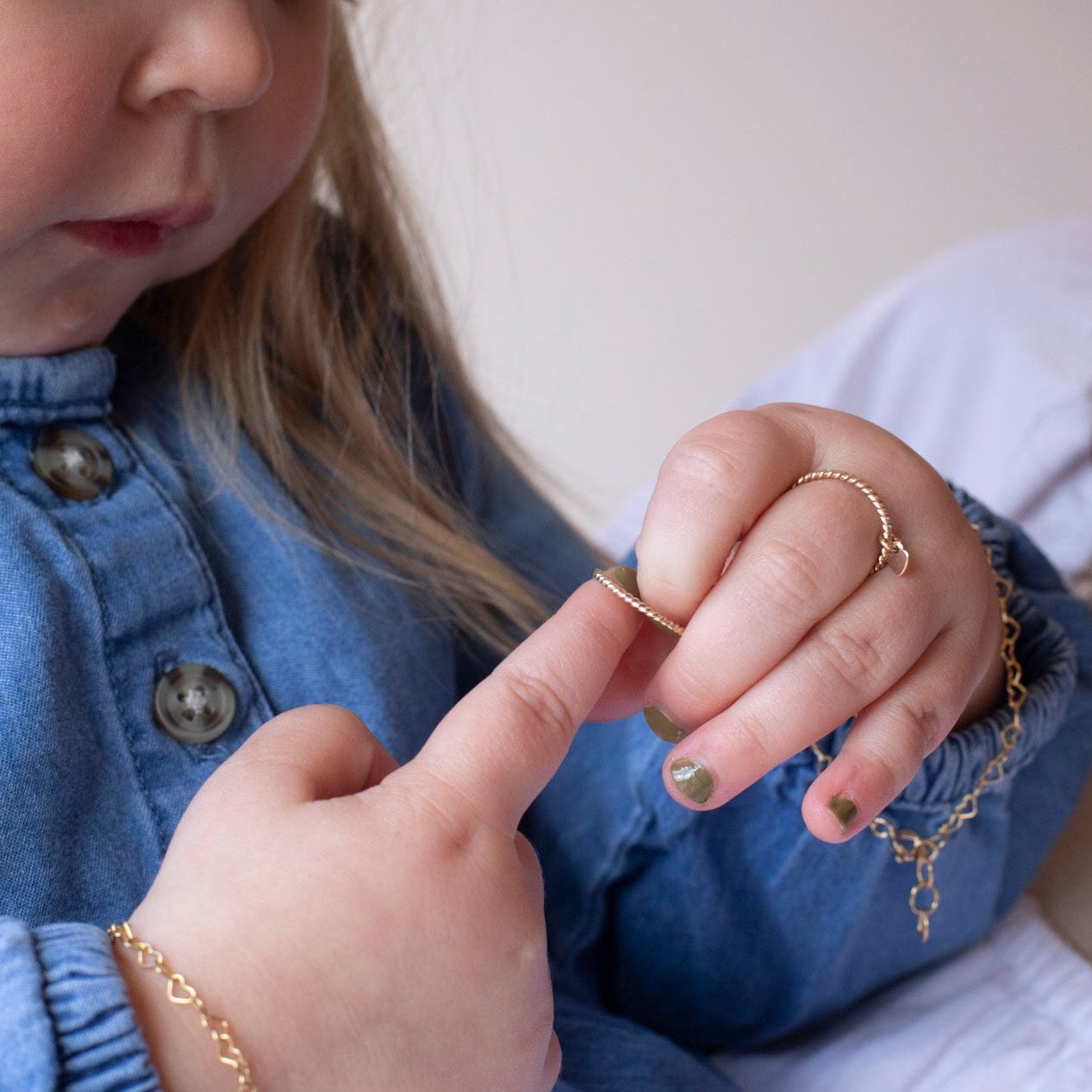 Model wearing Heart Charmed Children&#39;s ring