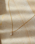 Featuring a delicate pearl and classic gold chain. Wedding Jewelry. Classic and Modern. Sterling Silver or 14k Gold Fill. Token Jewelry, handmade, hypoallergenic and waterproof.