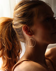 Model wearing Parallel Hoops - Token Jewelry